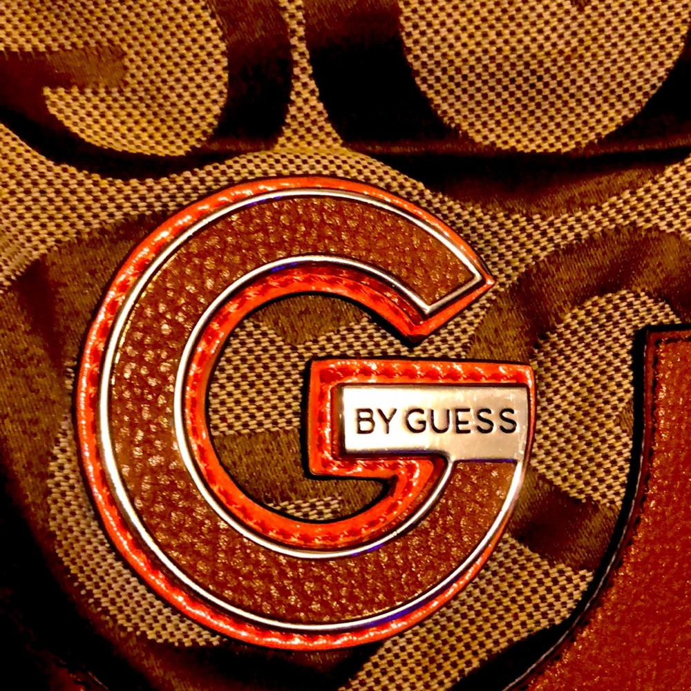 Slightly used pink by Guess purse